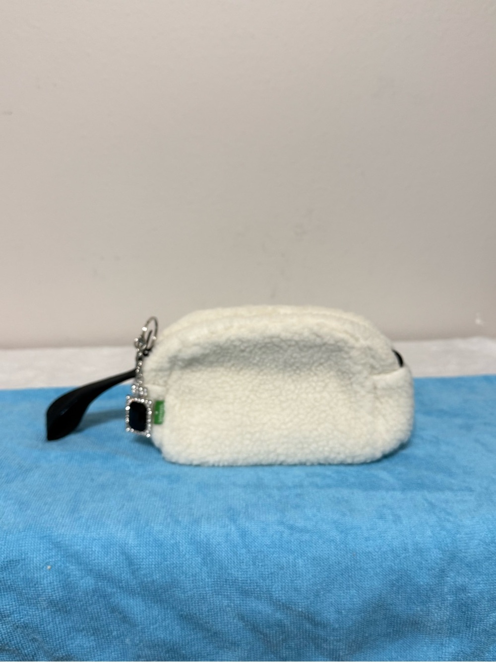 kate spade White Sherpa Wristlet Pouch with Black Strap